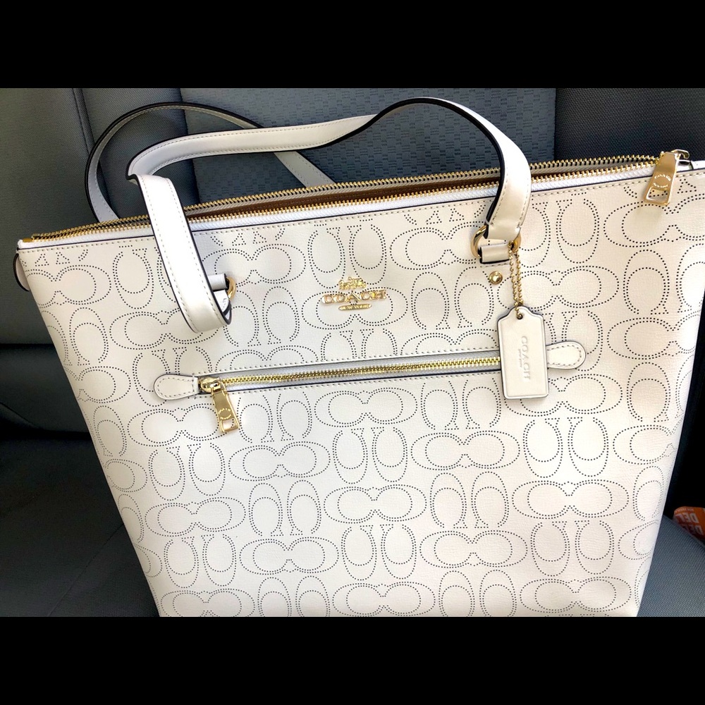 Brand new black and white coach purse